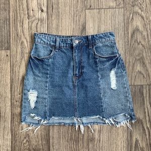 Distressed denim skirt
